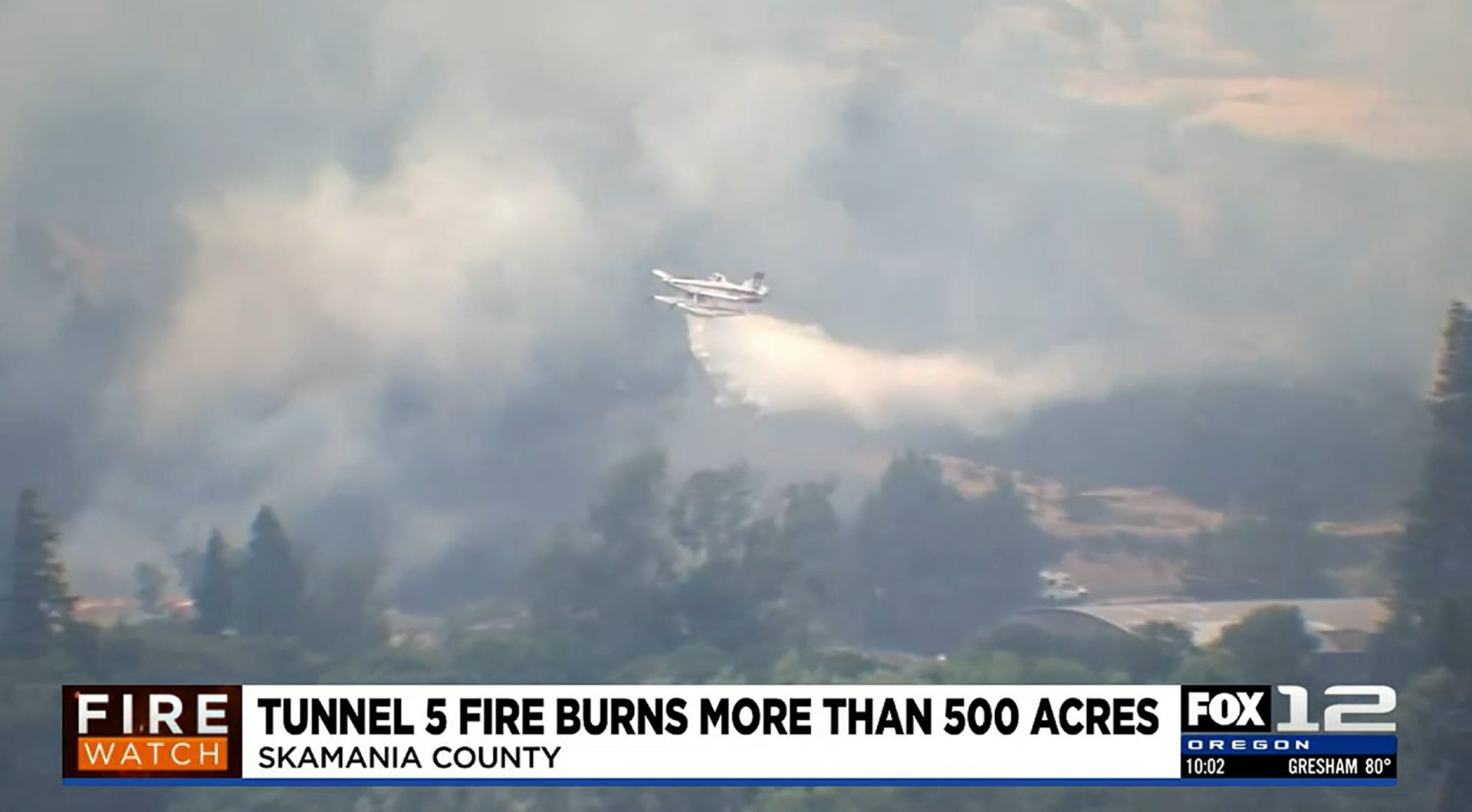 Fox12 Screenshot of Fireboss dropping water on fire